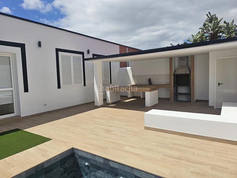 Foto fa7f7184-b848-4bfd-b98b-0252bca09146. Casa venta en Guargacho de dos casas con piscina en Arona