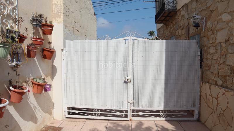 Foto 91c13b5a-91a3-4c98-ab66-49dde1b4c113. Casa adossada amb xemeneia a El Secanet-Hacienda del Sol Vila Joiosa (la)