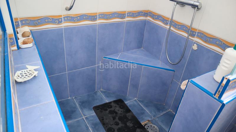 Foto af0de85a-88e7-46a2-bc33-656082140f2e. Casa adossada amb xemeneia a El Secanet-Hacienda del Sol Vila Joiosa (la)