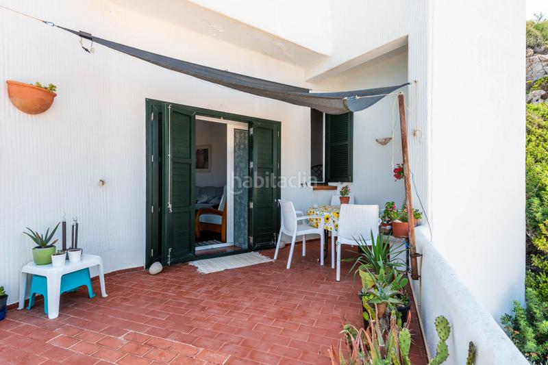 Foto a37888cb-8e98-4eeb-a945-92b923b0054d. Apartamento dúplex con vistas al mar en arenal den castell menorca exclusiva propiedad con potencial de reforma en Es Mercadal