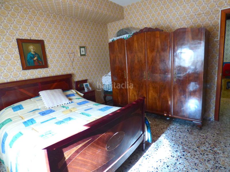Foto 7b420d09-2b19-46ae-881c-1f5fff3205a8. Casa aparellada amb xemeneia calefacció a Onil