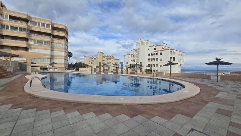 Foto c51aff0a-f978-4d42-b57d-01c5f80a29be. Casa amb aparcament piscina a Los Arenales del Sol Elche / Elx