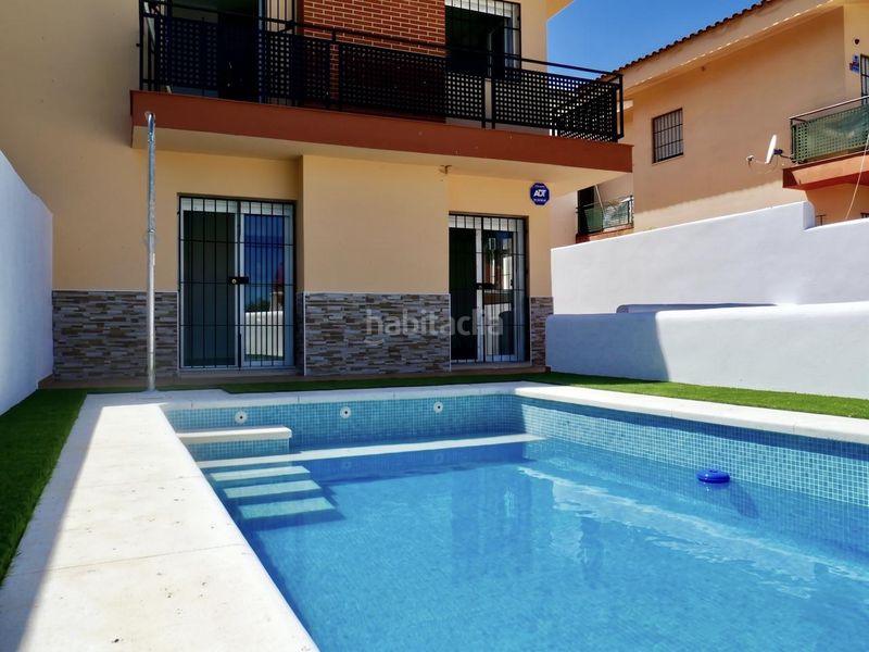 Foto 64e5d1ce-d1d9-406e-985e-a61e0765b5a3. Casa aparellada amb aparcament piscina a Ronquillo (El)
