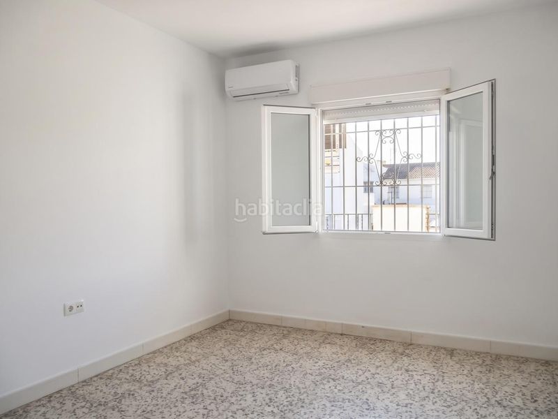 Foto 1b243c2a-7f39-40f5-8caa-599784e0ebb1. Casa adossada a Umbrete