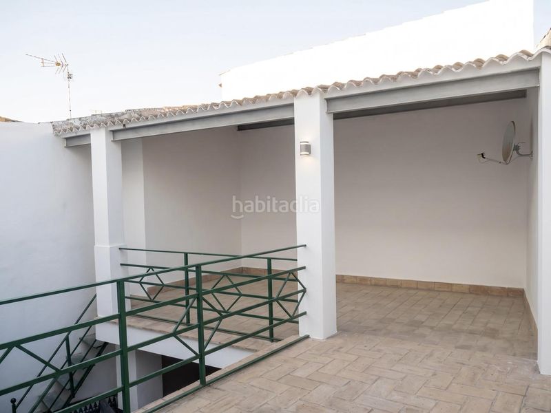 Foto a5aaa6dc-180e-4559-9786-aa8c78889398. Casa adossada a Umbrete