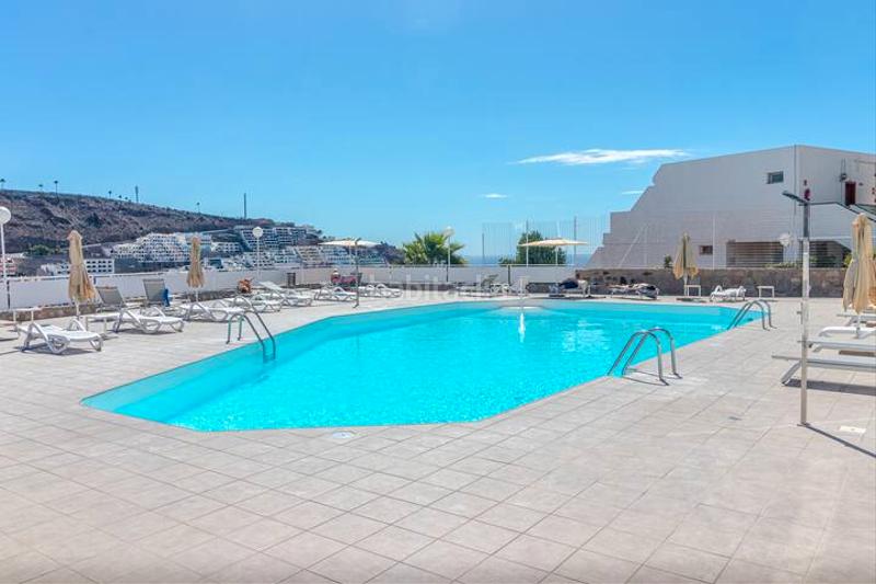 Foto 510eeeee-46ff-4b13-949b-24be1d9ea378. Piccolo appartamento con piscina in Puerto Rico Mogán