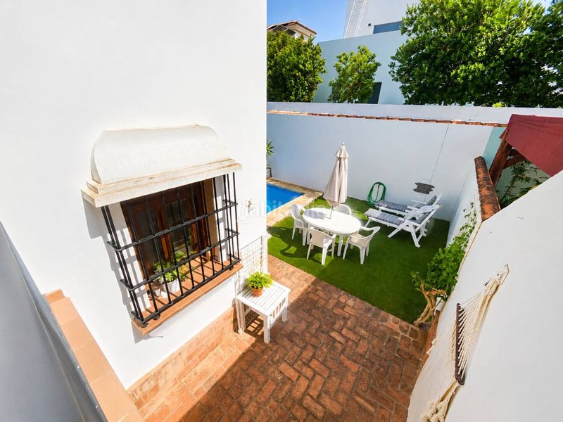 Foto fea1d24d-2ae7-4794-aebb-a641acfef151. Casa aparellada amb aparcament piscina a Núcleo urbano Chiclana de la Frontera