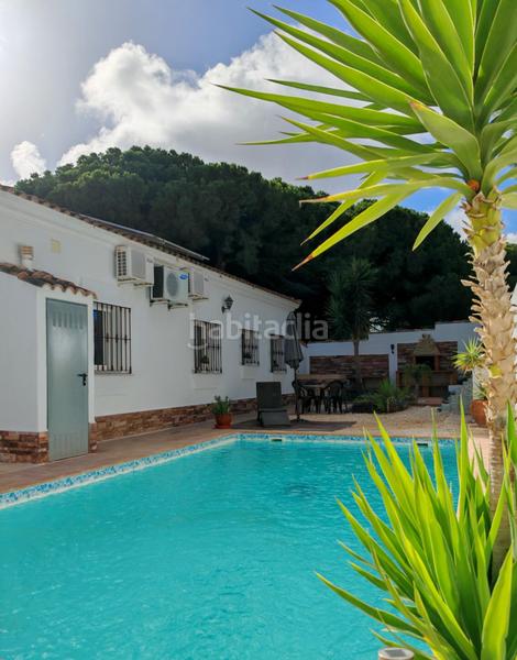 Foto b1b8f94f-6172-4b88-bbd2-f088eb88a715. Chalet avec parking dans Las Lagunas - Campano Chiclana de la Frontera