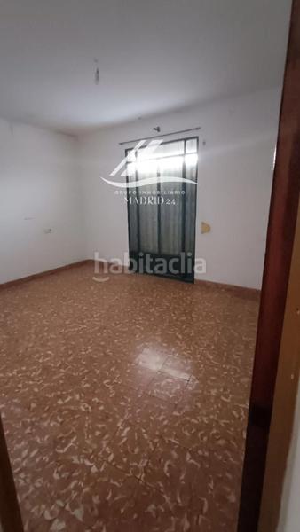 Foto 1599a1a8-edb6-483c-aaf9-57bce71ee787. Casa adossada a Morón de la Frontera