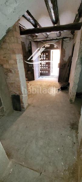 Foto 5122a2fb-1daa-48cf-832d-a36d0926f79a. Casa adosada adosado con potencial en lleida en Algerri