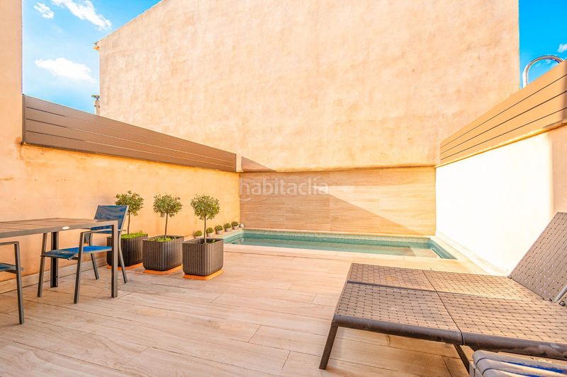 Foto 79532d61-c499-42c5-b0e7-b0f59fe24dbb. Casa adossada amb calefacció aparcament piscina a Marratxí