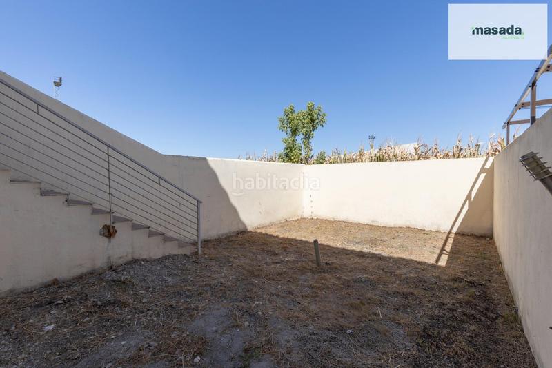 Foto 1062e5a9-c781-4efe-ad1e-1f03c418f43c. Casa adossada amb aparcament a Belicena Vegas del Genil