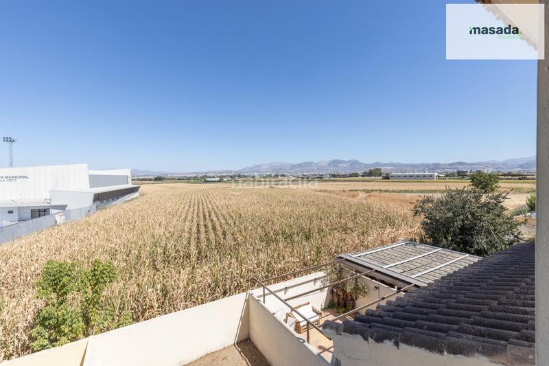 Foto a48ac582-8ac0-484b-a78a-5222c9cd4360. Casa adossada amb aparcament a Belicena Vegas del Genil