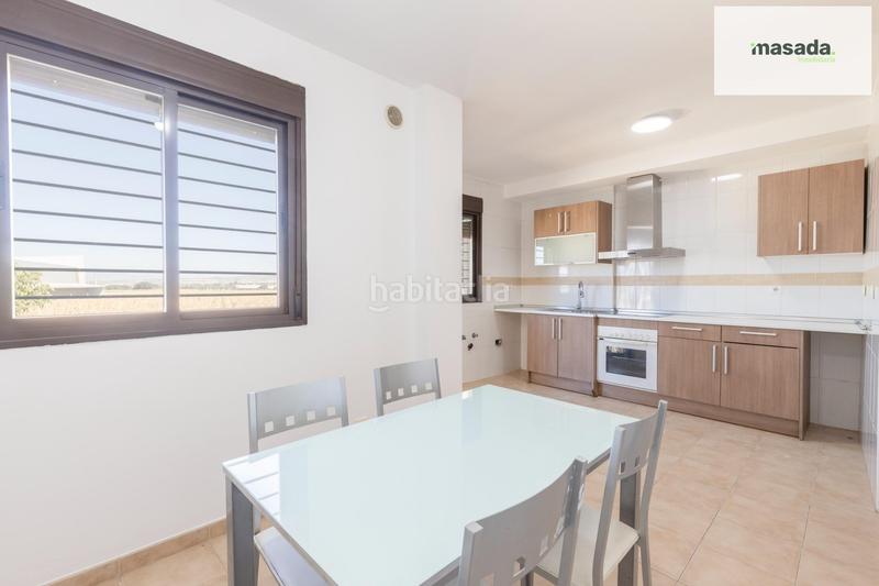 Foto f76ad31f-b003-4b21-89f4-ba2d35f778bb. Casa adossada amb aparcament a Belicena Vegas del Genil