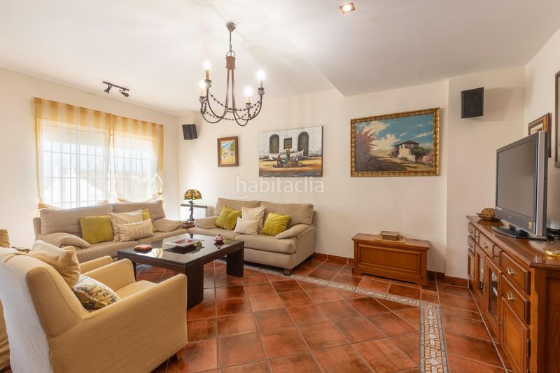 Foto 039e1e6b-8367-416d-901c-79b668b44537. Casa adossada a calle calle níspero 5 a Cájar