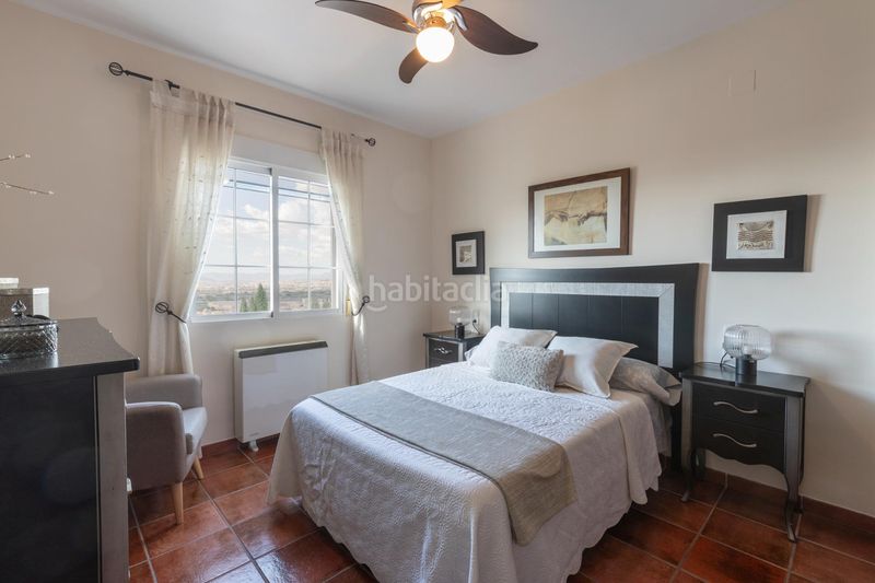 Foto bdf7e9e4-3a83-475a-99bf-2e8479801c76. Casa adossada a calle calle níspero 5 a Cájar