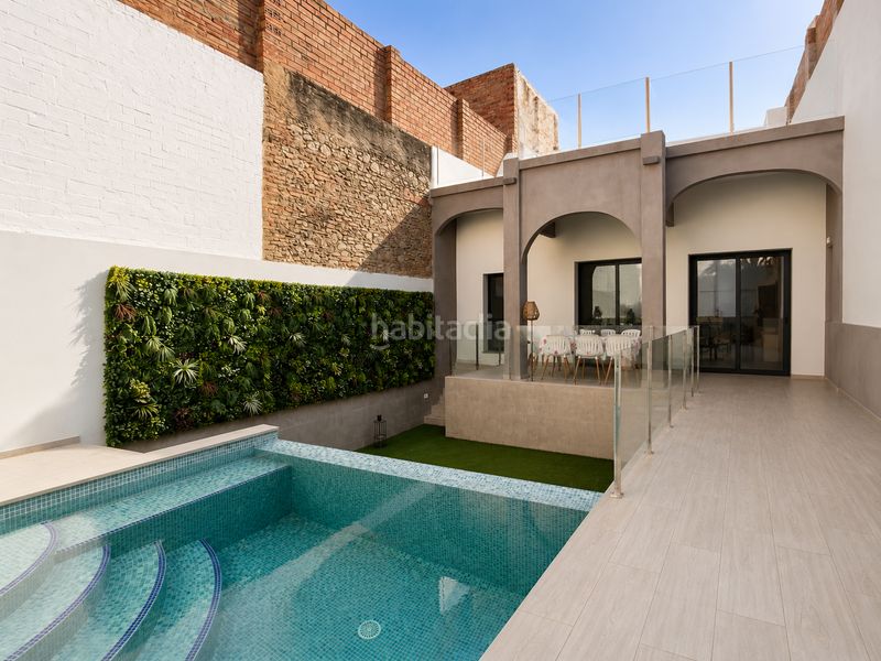 Foto 996bdaf7-2a8f-4785-8ff2-5ff2abd81e90. Casa adossada amb calefacció piscina a Eixample-Horta Capallera Figueres