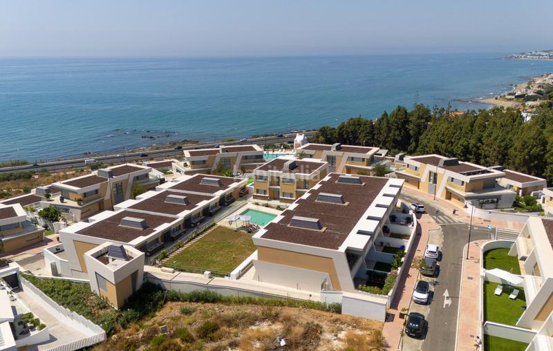 Foto 6fb2a8f4-34d0-4bcf-8009-c51a6a9c4cdd. Casa adossada amb calefacció aparcament a El Faro de Calaburra - Chaparral Mijas