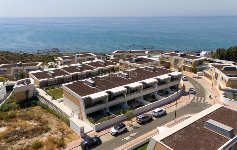Foto c43d4074-924b-4955-bb65-1255520c2d13. Casa adossada amb calefacció aparcament a El Faro de Calaburra - Chaparral Mijas