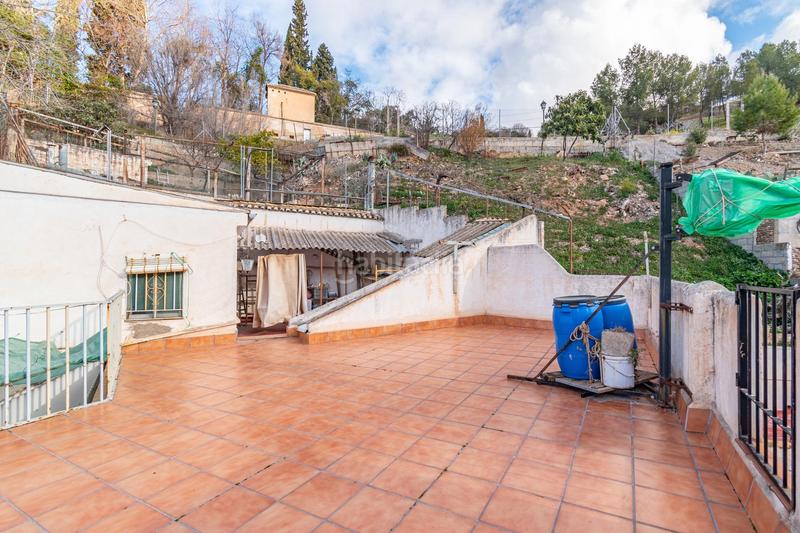 Foto 49fa8090-bfcf-42f7-a723-5f7dea14ac8c. Casa  con cuevas y terreno en barranco del abogado en Granada