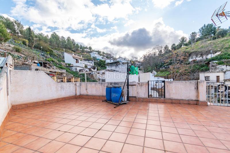 Foto cc45b883-a35f-4e53-b6bd-76bae36305bc. Casa  con cuevas y terreno en barranco del abogado en Granada