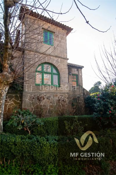 Foto f1a1fceb-0d0f-400f-89c0-4db0c3dff179. Xalet amb xemeneia aparcament a Teis Vigo