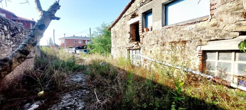 Foto c74a075c-8652-46ef-9c91-27679a011449. Casa adossada a Oruña Piélagos