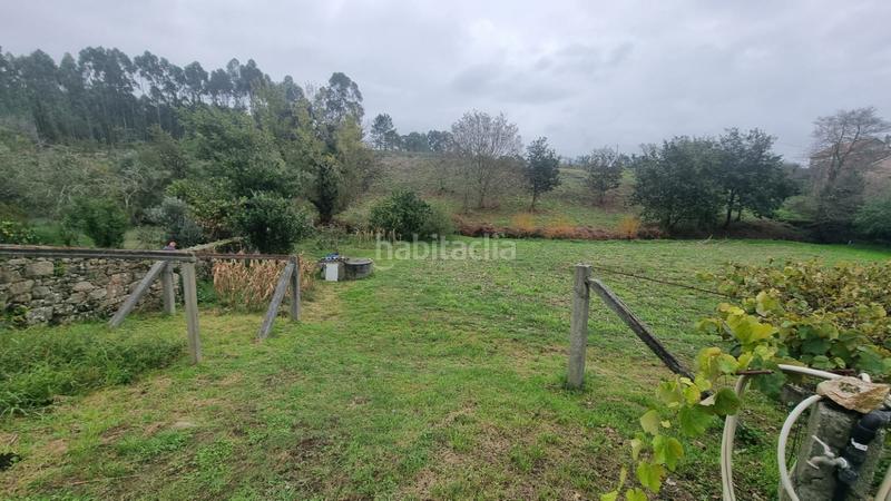 Foto 451885fe-36e5-4bf8-a238-f61d3bf6cf10. Terreno residencial en Olveira - lg sirves 110 finca en venta en sirves, en Ribeira