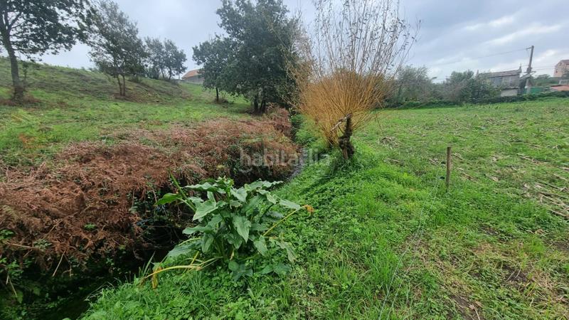 Foto 8ed91677-d1b5-4bc9-99f7-c3633f131810. Terreno residencial en Olveira - lg sirves 110 finca en venta en sirves, en Ribeira