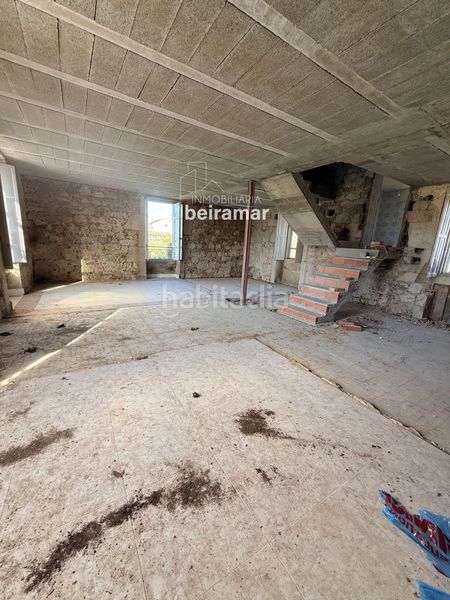 Foto e114e5b2-e3dd-4f6d-b57a-b25c312f7d2e. Casa a Olveira Ribeira