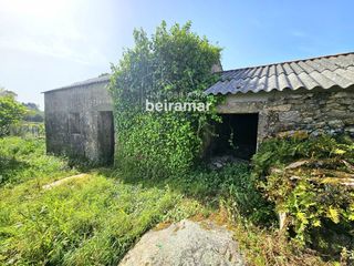 Maison  Laxes. Casa de piedra con finca y vistas al mar en carreira ribeira  gr