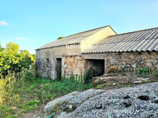 Maison  Laxes. Casa de piedra con finca y vistas al mar en carreira ribeira  gr