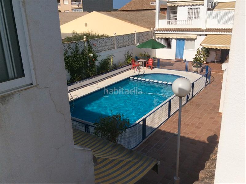 Foto 12d9dae8-a7bf-4d72-b6fc-aca63a9f1964. Semi detached house with fireplace parking pool in Alcázares (Los)
