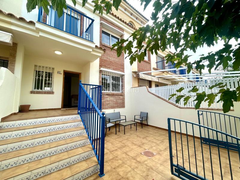 Foto c6dc9cbb-6fd9-4943-a124-dc684c71f43e. Casa adossada a Campoamor Orihuela