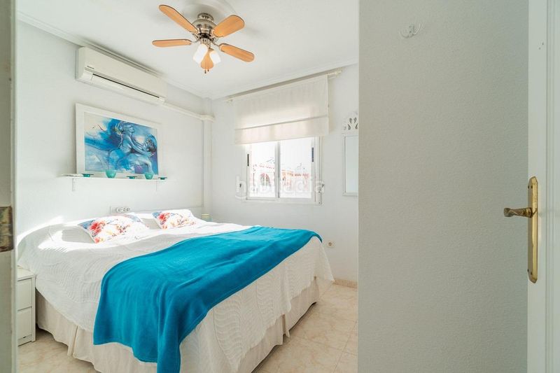 Foto 8b73e93c-e91b-4269-a83d-d0c23ef85923. Casa adossada a Playa Flamenca Orihuela