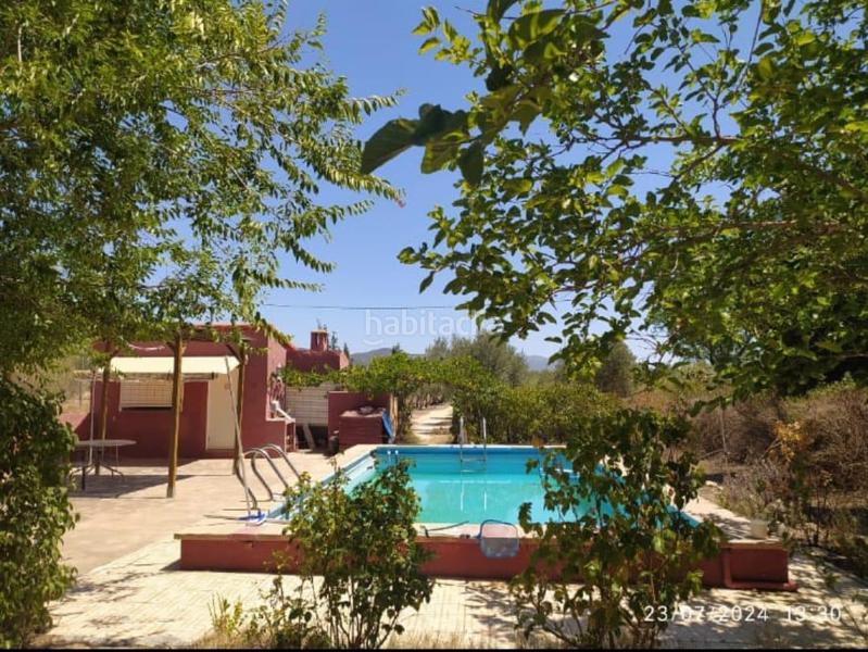 Foto 86de8dde-cd40-4e99-ba6b-f4507941b2e1. Masía chalet con piscina y dos edificaciones en Onil