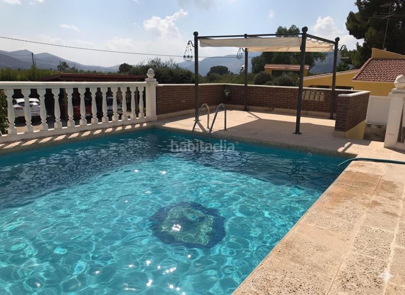 Foto 8f5dd1c8-62dc-4759-b9e1-bb81903efc83. Masia amb piscina a Onil