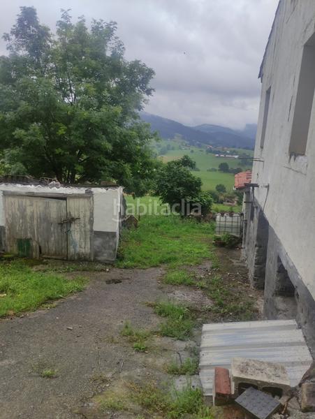 Foto eca6e8d3-a858-4a6e-a418-7a55484df893. Casa adossada a montaña la - avda. bilbao 176 a Sierrapando Torrelavega