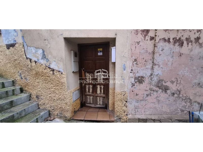 Foto c82f9113-abd1-4009-880c-672a50a4f8b0. Casa adossada a Artés
