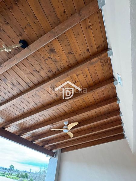 Foto a77e5a3f-7b37-4121-a2c0-4bcd2854bf01. Casa adossada amb aparcament a Benimuslem
