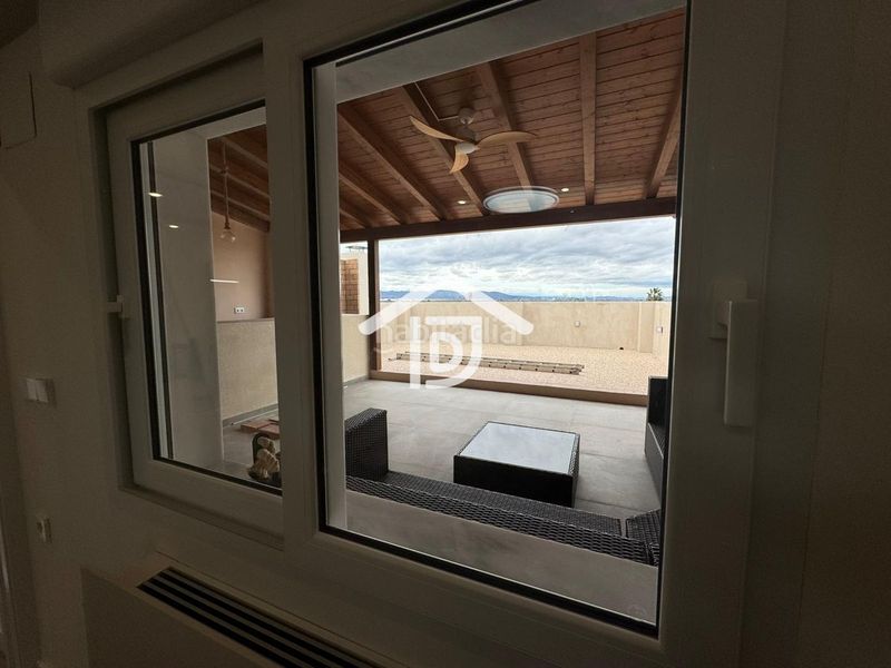Foto befc1365-f429-4b94-a24d-db620c75dd96. Casa adossada amb aparcament a Benimuslem