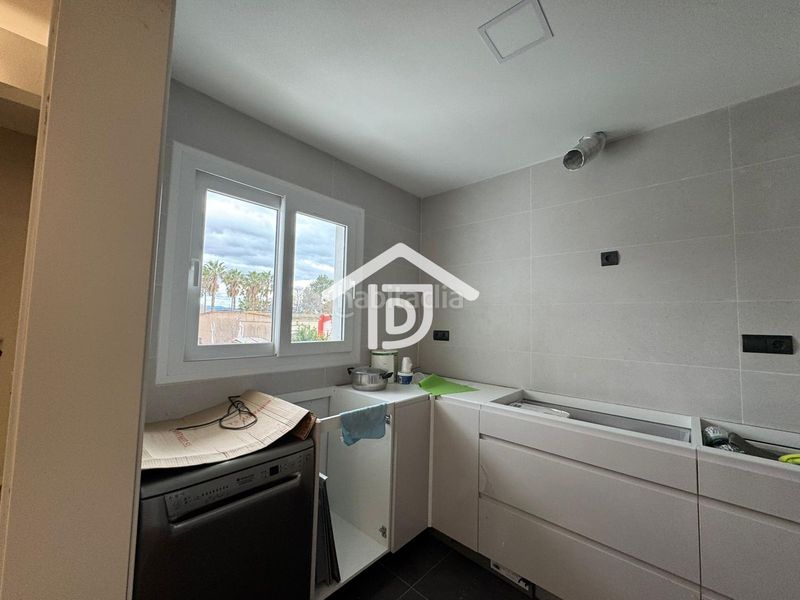 Foto ce6a9cea-9291-43c0-9c89-5dd94bbef013. Casa adossada amb aparcament a Benimuslem