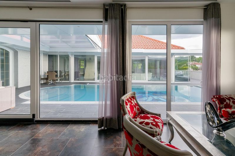 Foto 6b699454-f1c0-40b2-9e35-99f1d87af814. Chalet avec chauffage parking piscine dans Nogueira de Ramuín