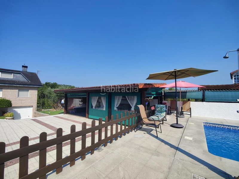 Foto 20a093ed-9e63-40ca-9114-ada678c17cb6. Casa amb calefacció aparcament piscina a Mariñamansa Ourense