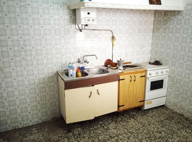 Foto efde3b7b-4441-4fcc-9240-05b25bb8e978. Casa adossada a Larache Ciudad Real
