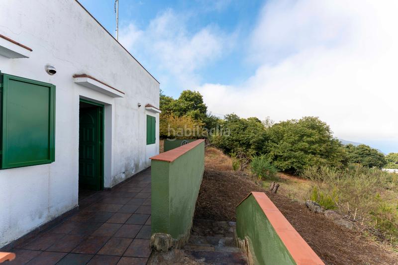 Foto 19edeaae-9a5a-48e7-a479-037c1664e9b1. Masia amb xemeneia aparcament a La Perdoma - San Antonio - Benijos Orotava (La)