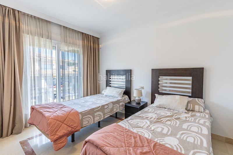 Foto 22860156-0ad1-4685-a05c-b3cedbb12724. Casa aparellada amb aparcament piscina a Riviera del Sol Mijas