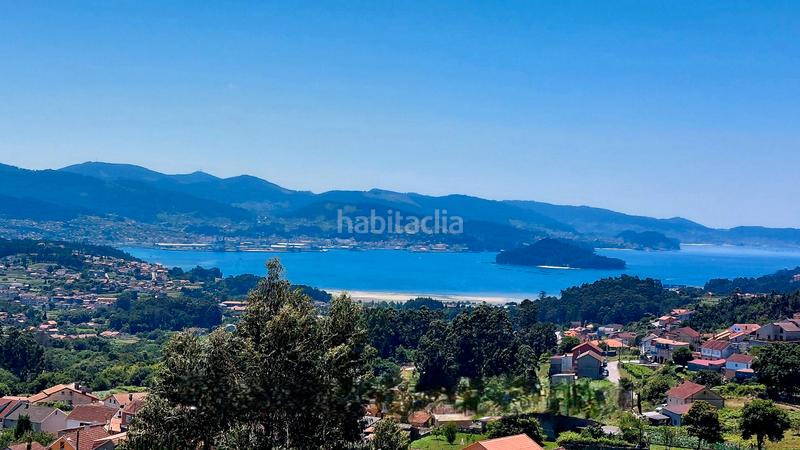 Foto e214213f-104a-472f-9bbf-3f4a76e770a0. Terrain résidentiel dans Poio