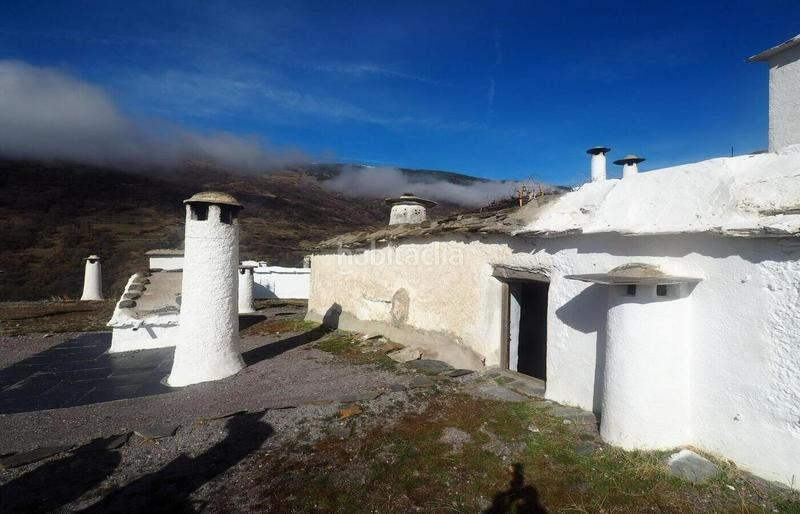 Foto 32a330e0-747b-486c-8a5e-3578dab22db6. Casa aquí no hay tráfico. hay calma, piedra antigua y una casa con ganas de volver a brillar. en Capileira