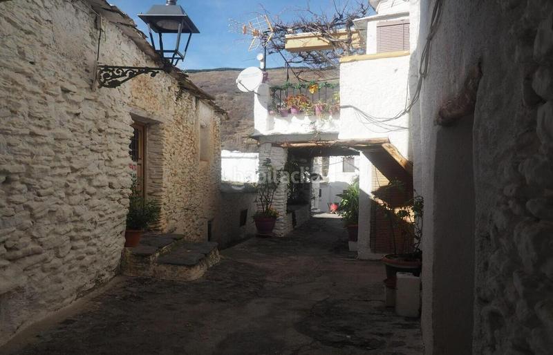 Foto 38d2bc06-b256-4fbe-9192-4565b4211ad8. Casa aquí no hay tráfico. hay calma, piedra antigua y una casa con ganas de volver a brillar. en Capileira